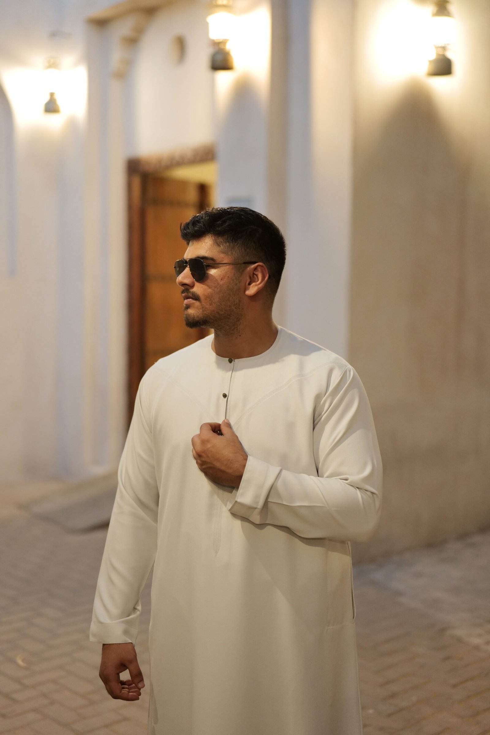 Emirati Cream Kandura Thobe Khaki green button side view